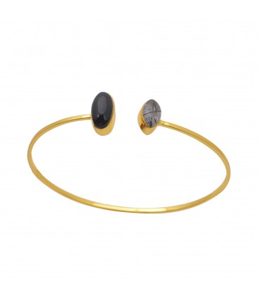 Pulsera en Plata con baño de oro, ónix y cuarzo.